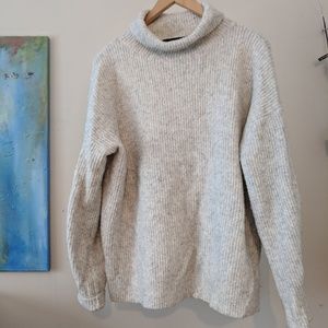 Soft turtleneck sweater with balloon sleeves